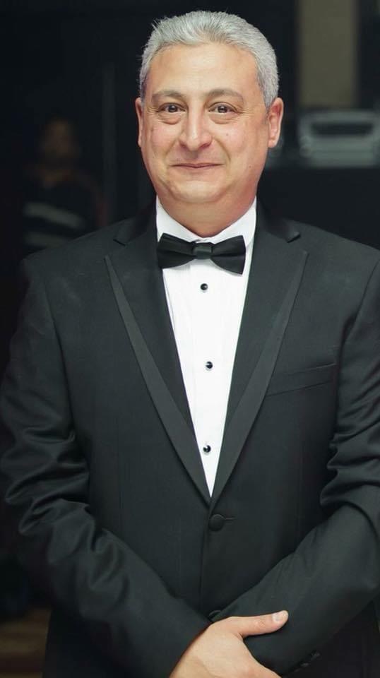 Hany Fahim Armanious, known as Billy Brown, in a black tuxedo and bow tie