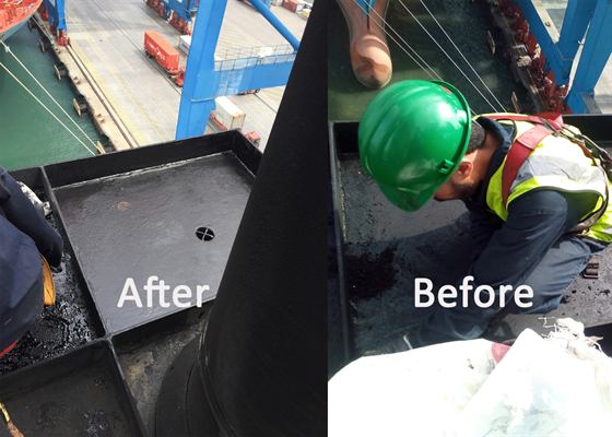 Before and after: worker in a harness clearing soot from the funnel deck, which is left clean