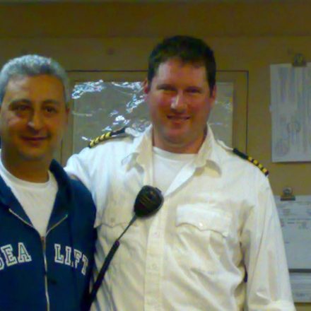 Billy Brown with a ship's officer in uniform