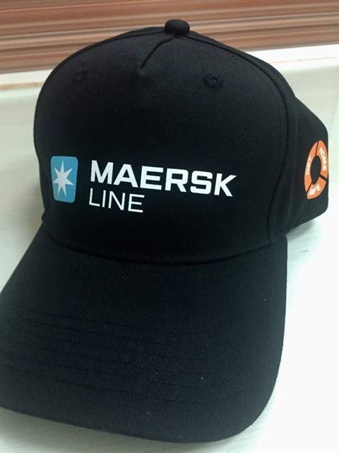 Black Maersk Line cap with a Get Home Safe badge on the side