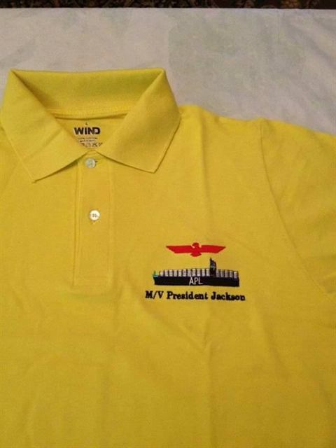 Yellow polo shirt embroidered with the APL crest and M/V President Jackson