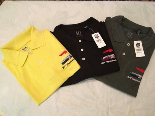 Yellow, black and grey polo shirts embroidered with the APL M/V President crest